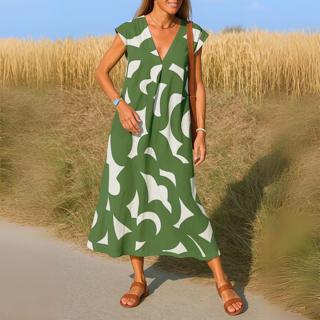 OMNIYA™ | Abito fluido con scollatura a V