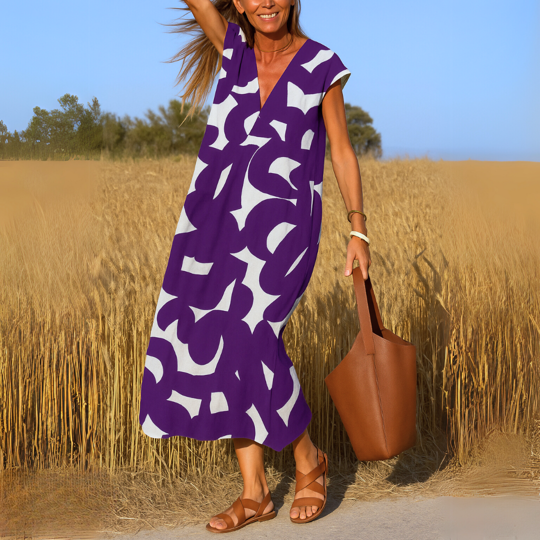 OMNIYA™ | Abito fluido con scollatura a V