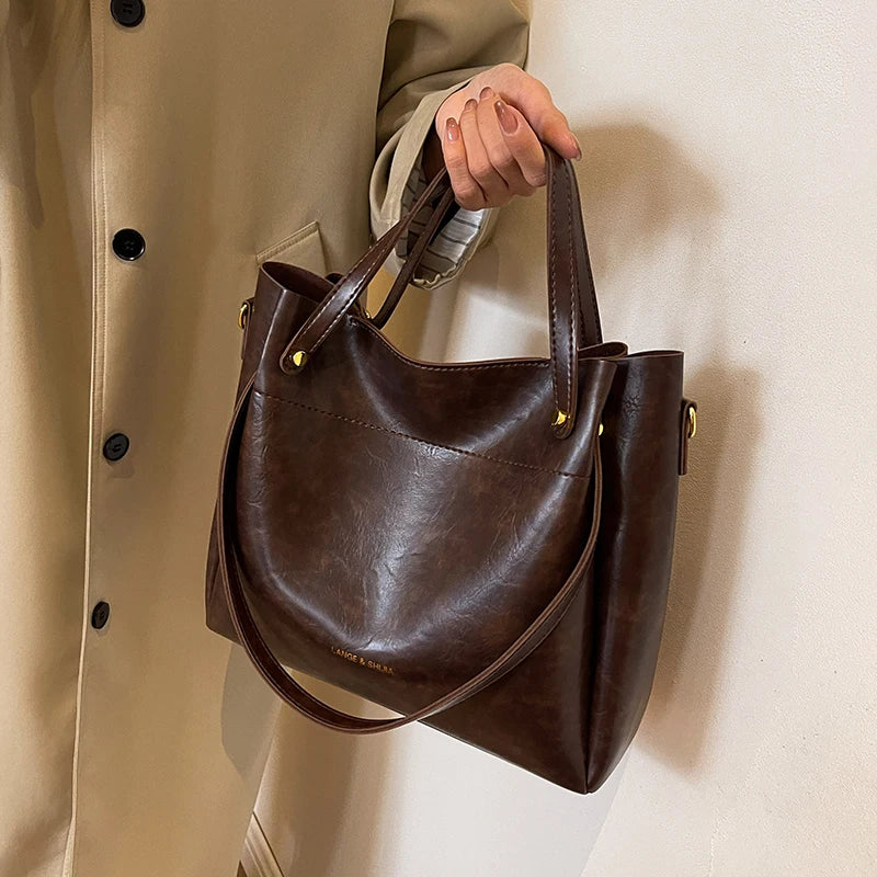 OMNIYA™ | Borsa elegante con due tracolle