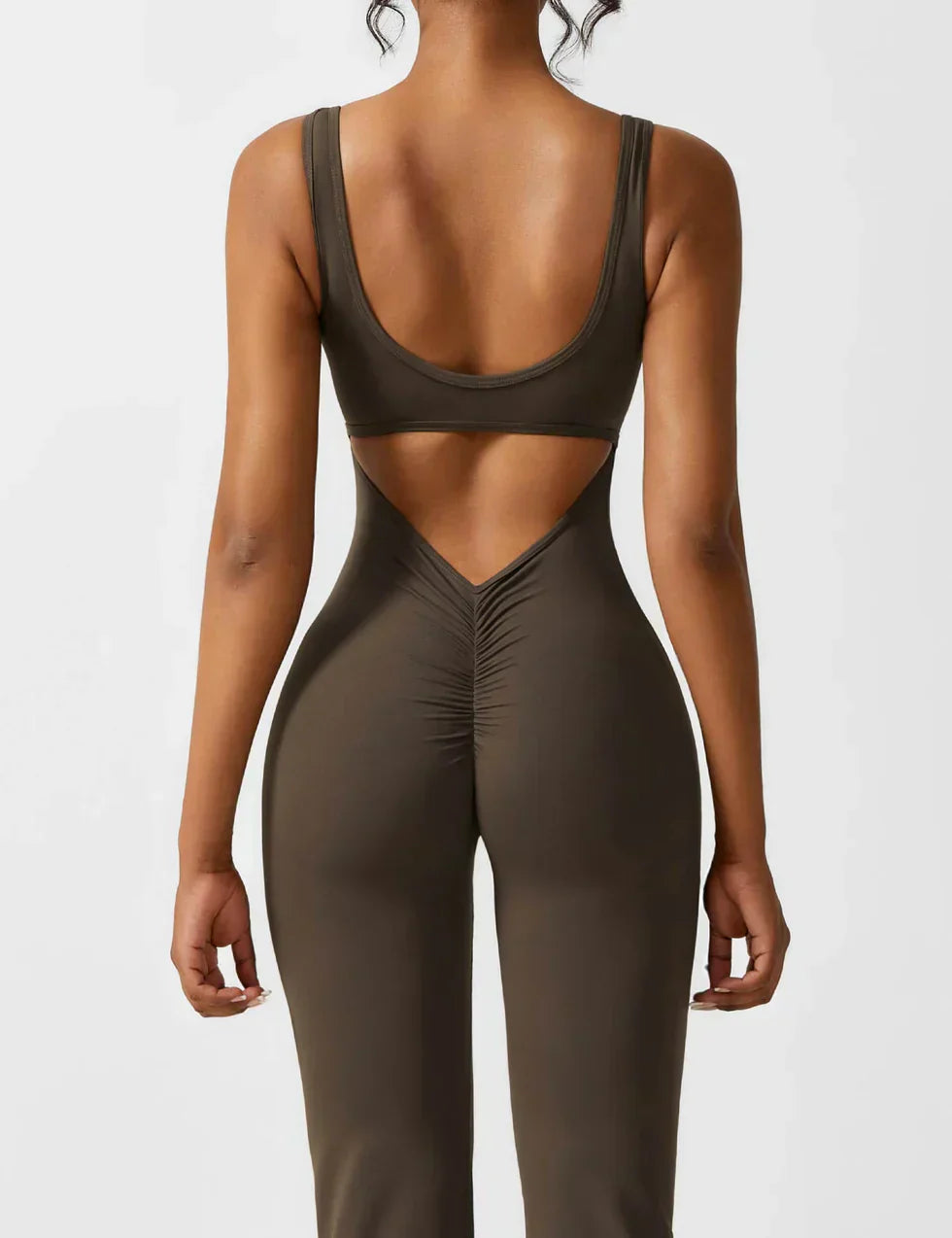 OMNIYA™ | Tuta Flared con V-Scollo