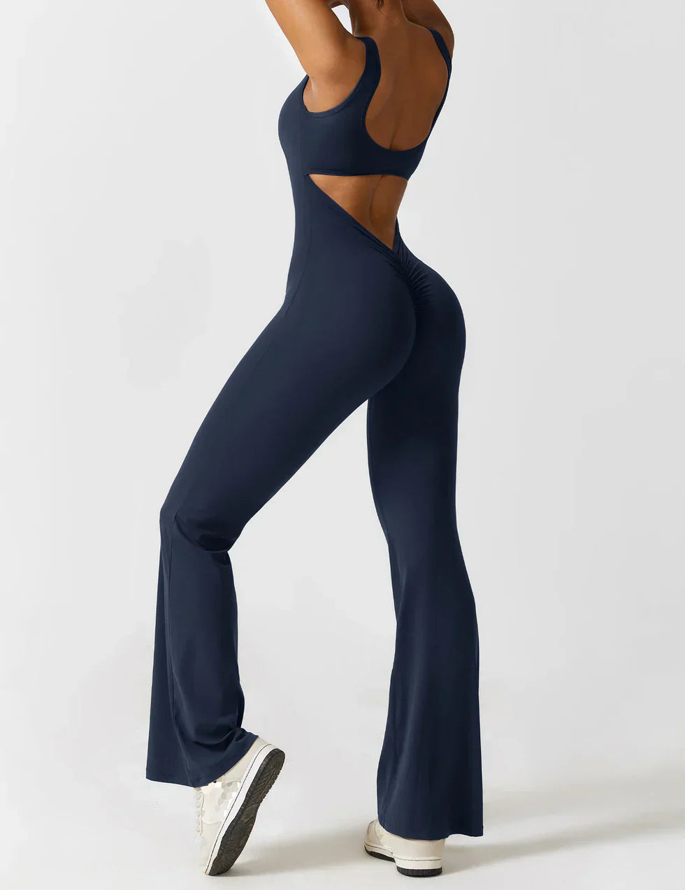 OMNIYA™ | Tuta Flared con V-Scollo