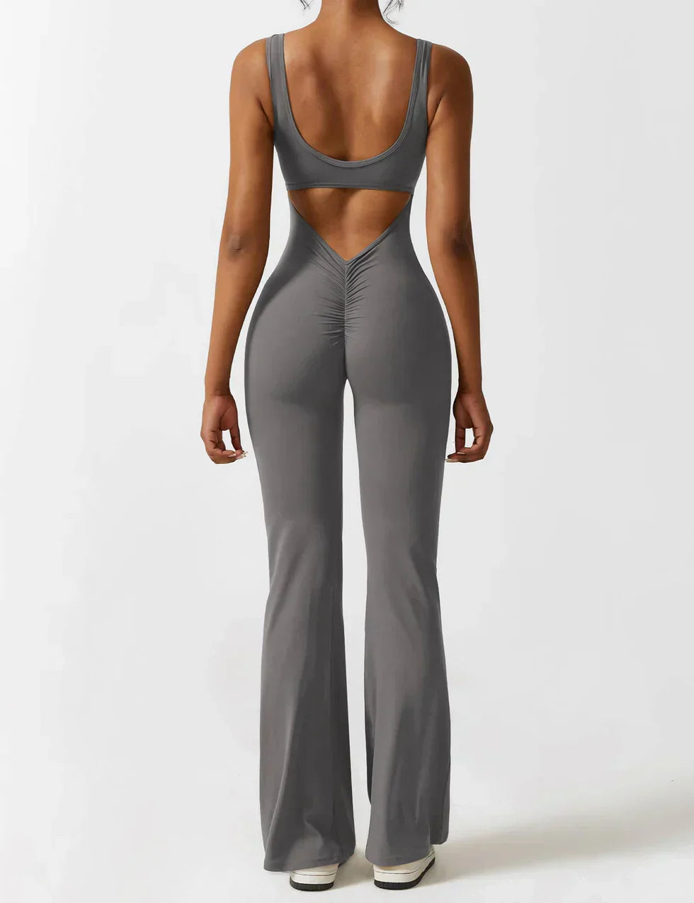 OMNIYA™ | Tuta Flared con V-Scollo