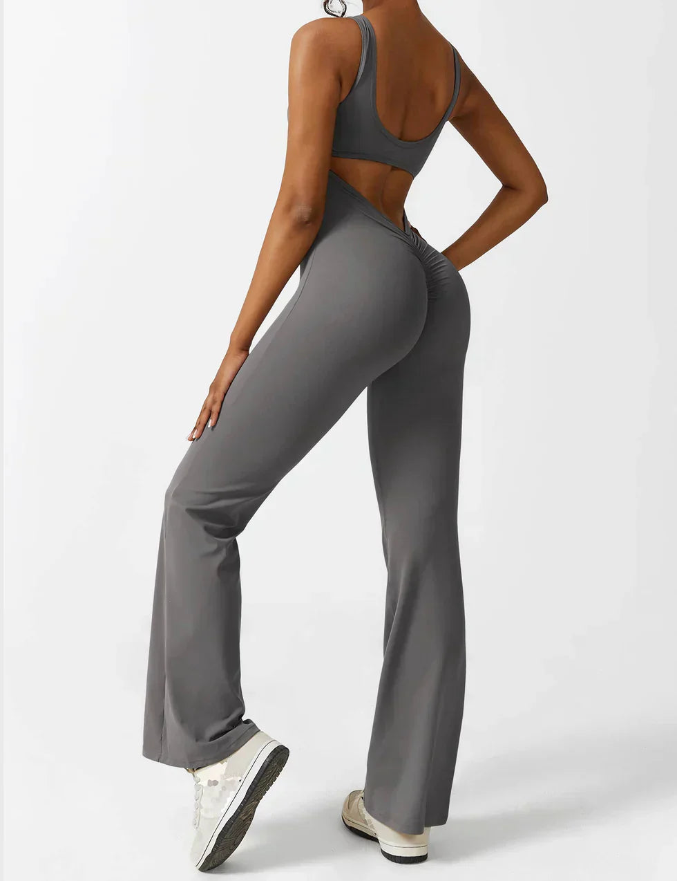OMNIYA™ | Tuta Flared con V-Scollo