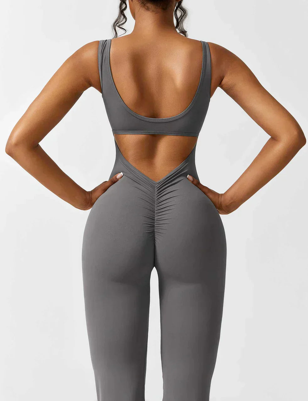 OMNIYA™ | Tuta Flared con V-Scollo