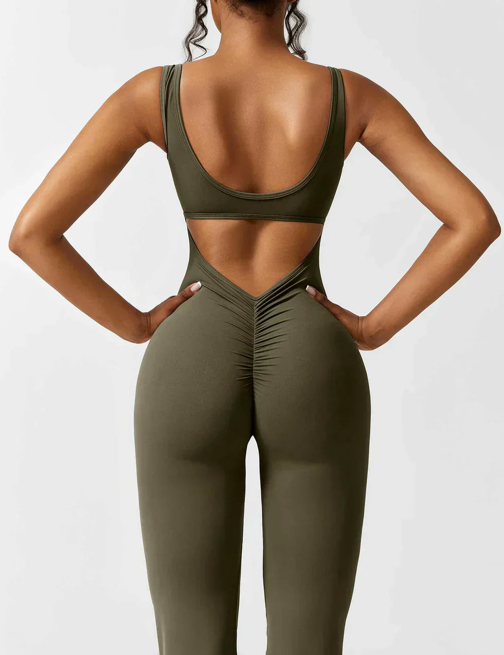 OMNIYA™ | Tuta Flared con V-Scollo