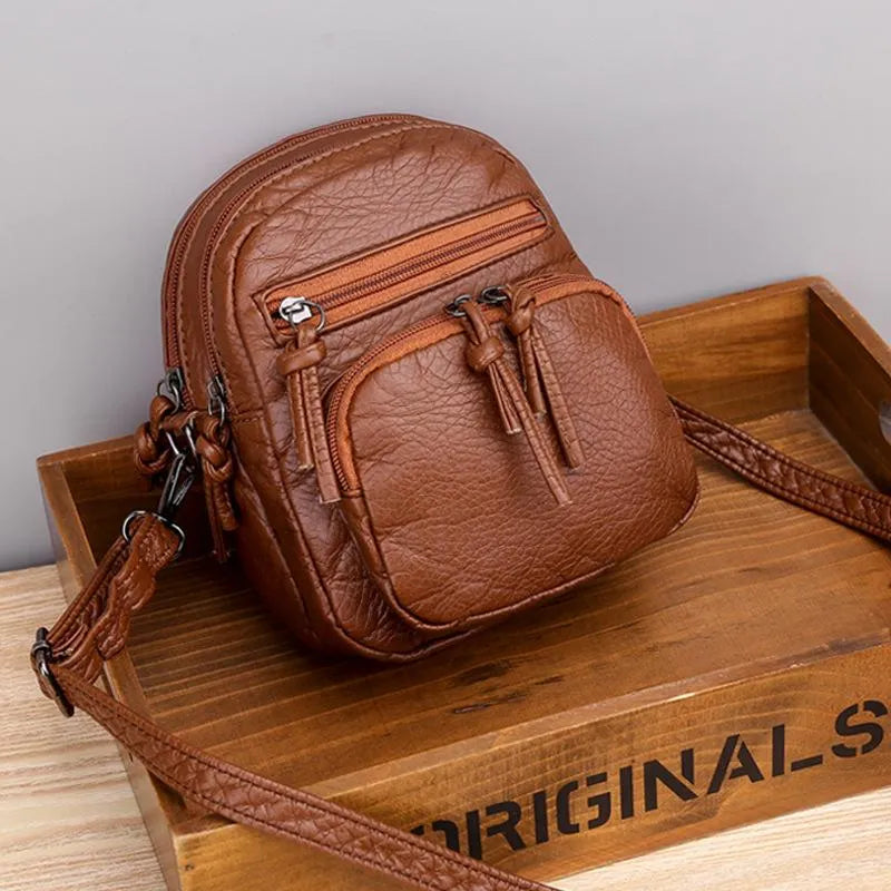 OMNIYA™ | Borsa a tracolla base