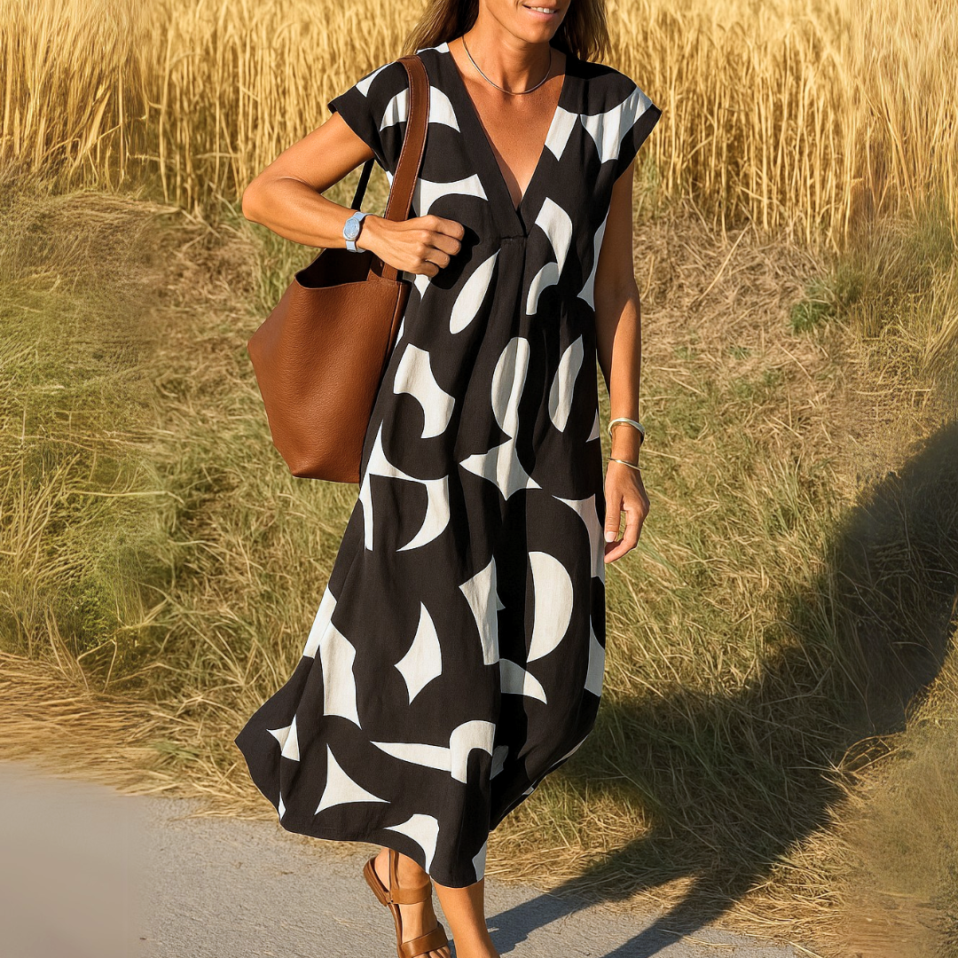 OMNIYA™ | Abito fluido con scollatura a V