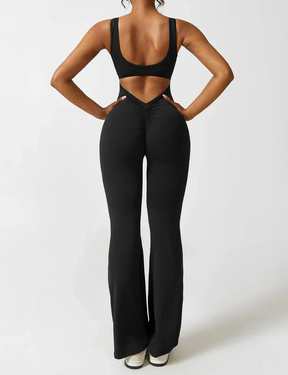 OMNIYA™ | Tuta Flared con V-Scollo