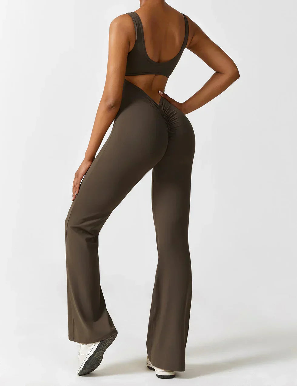 OMNIYA™ | Tuta Flared con V-Scollo
